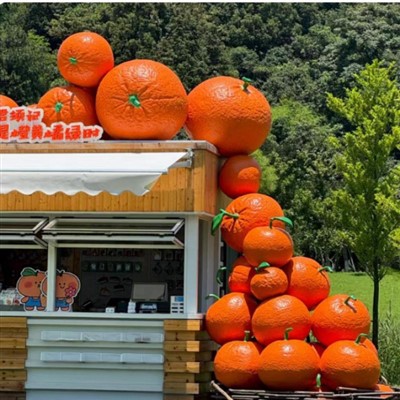 Gran escultura de fruita